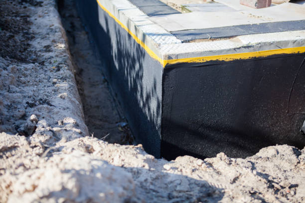 Professional Waterproofing technician working in Francesville, IN